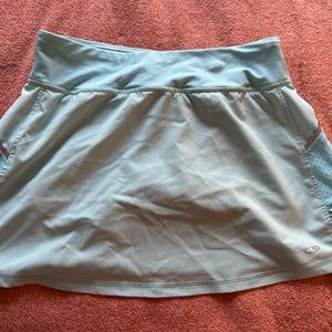 Blue Champion tennis skirt. Great condition. Never worn. Size small. Spandex!
